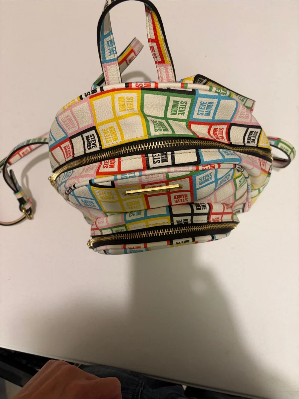 Steve Madden White Mini Backpack with Multicolor Logo Grid
